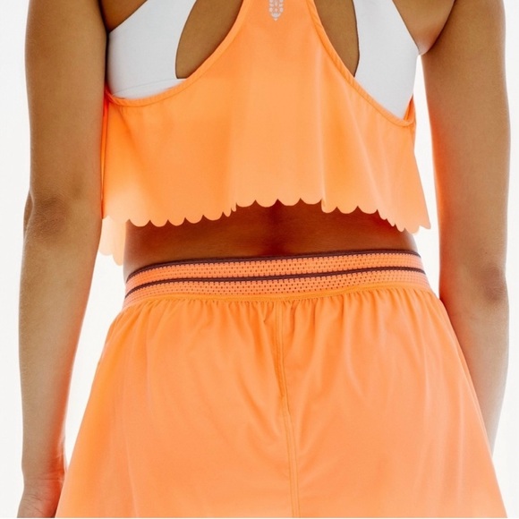 Free People Movement Pretty Lil Running Top in Neon Mango. - Picture 2 of 15